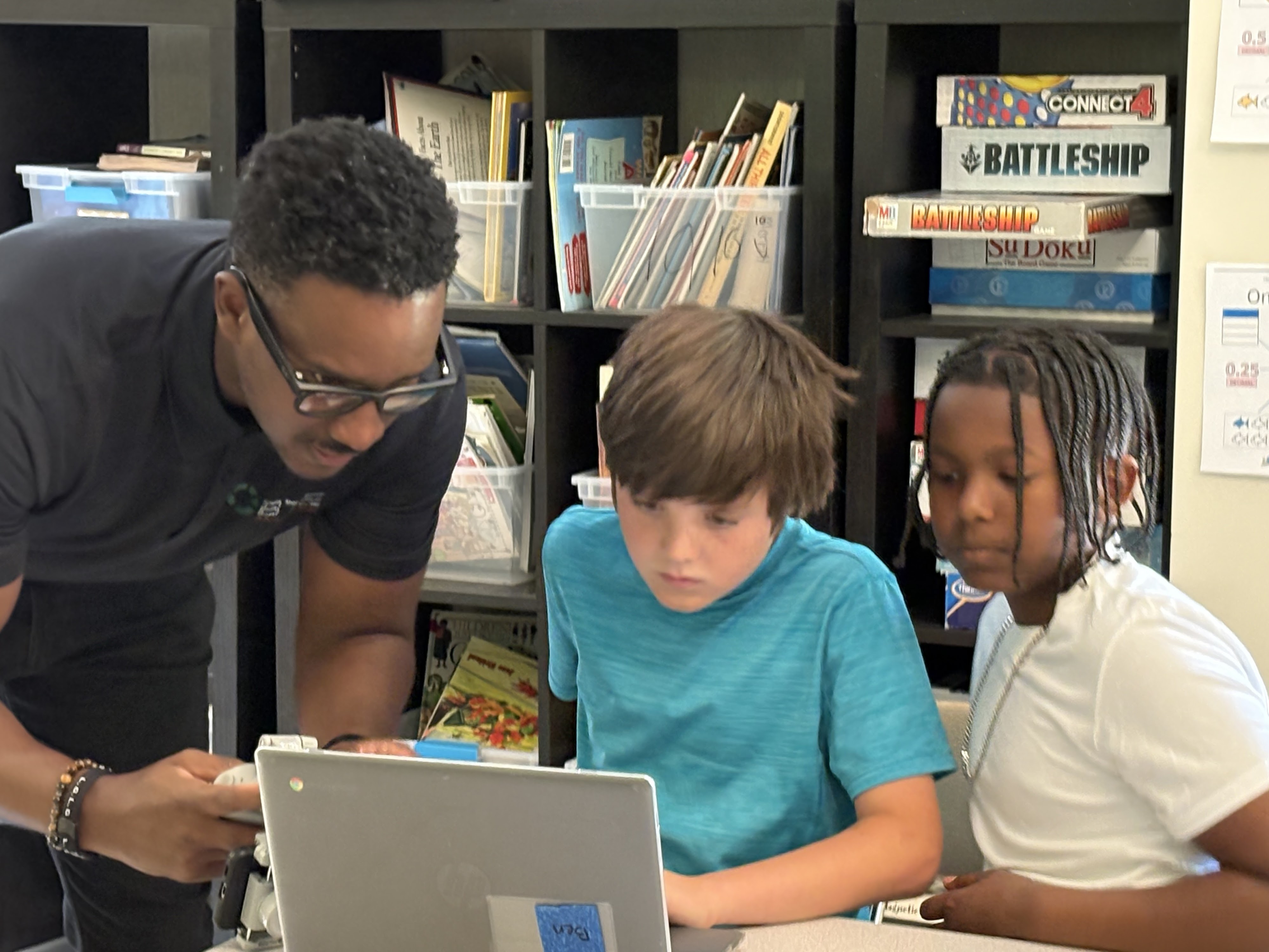 Teacher demonstrating BallCode on computer